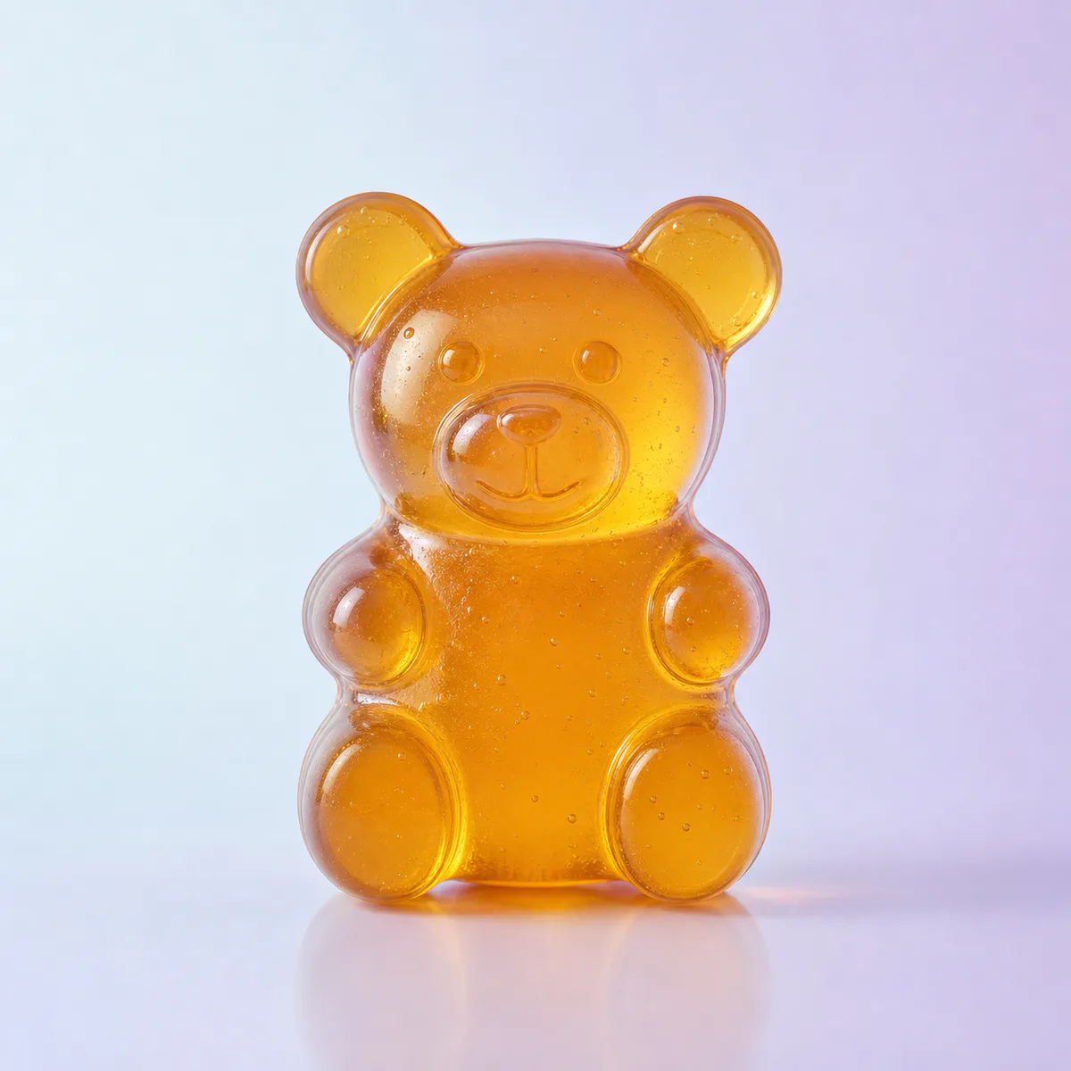 Sweet Bear Jelly Squish: translucent amber jelly bear on a soft pastel background