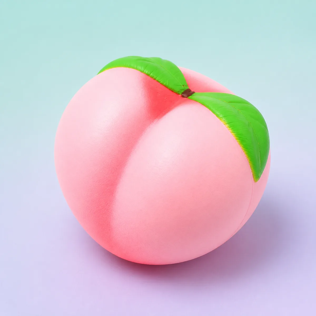Peachy Slow-Rise Squishy, Blush Peach shown on a soft pastel studio background