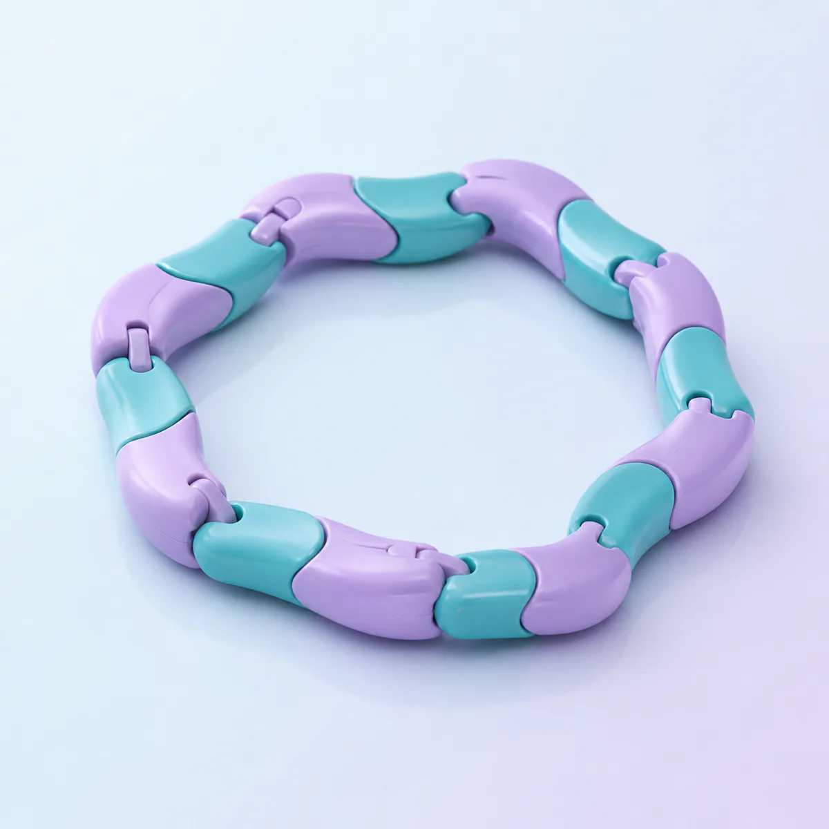 Twist Loop Fidget: connected teal and lavender swivel segments on a soft pastel background